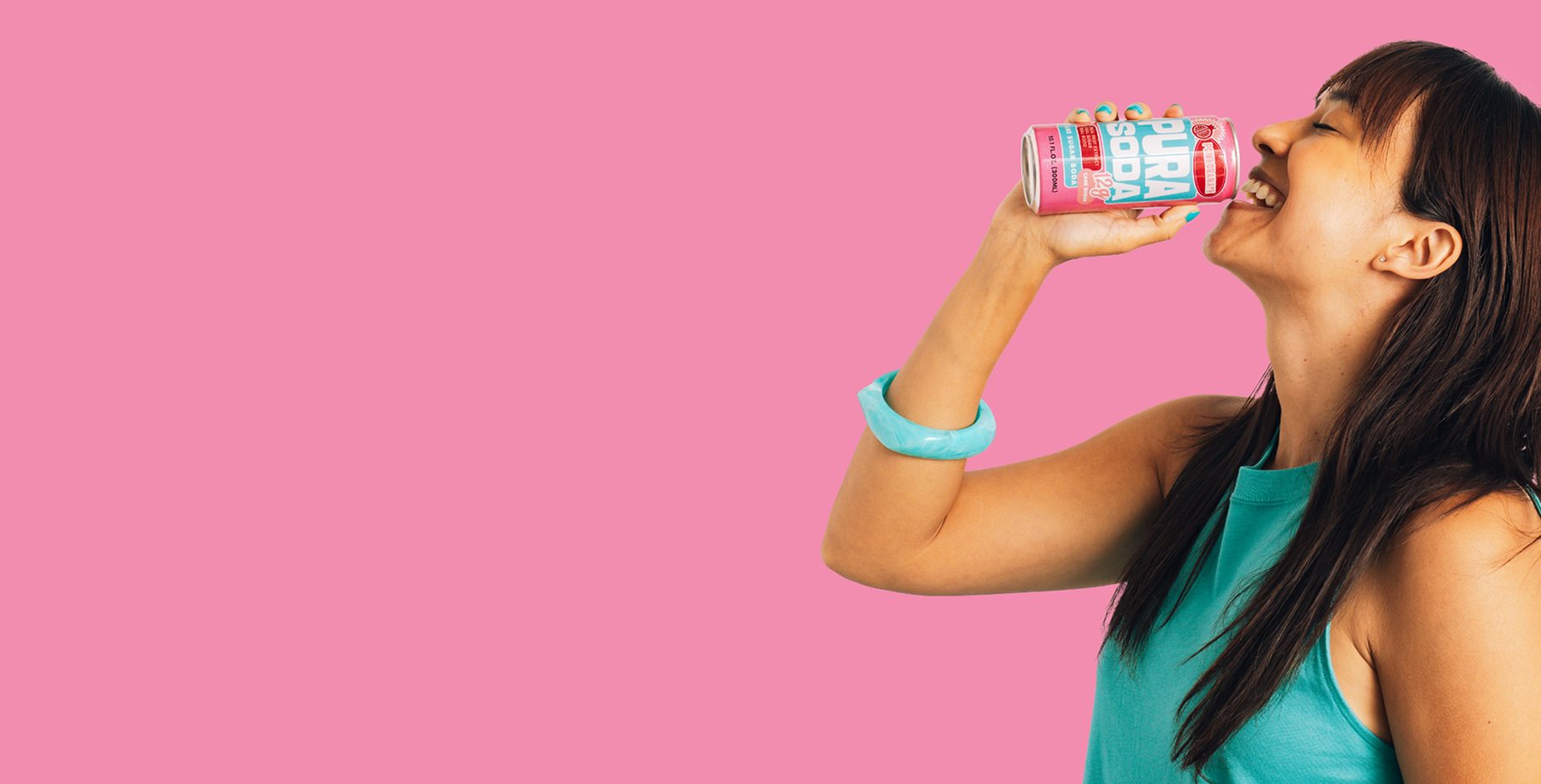 Woman Enjoying Pura Soda Slider